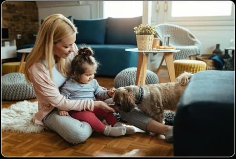A family relaxing at home with their pets